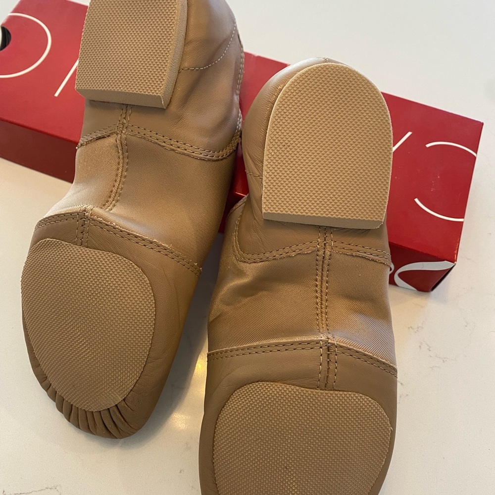 New Capezio jazz shoes, half soles & slightly used jazz shoes. All 3 included.